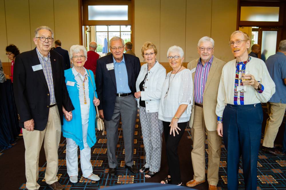 Friends posing together at the Retiree Reception.